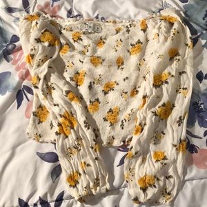 Crop top long sleeve from Hollister size medium white with flowers on them